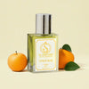 Citrus Blue Parfum Bottle in cream background